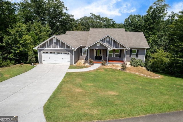 craftsman house featuring a front lawn, a porch, and a garage