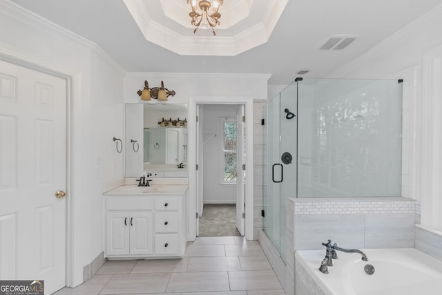 bathroom with tile patterned flooring, vanity, ornamental molding, and shower with separate bathtub