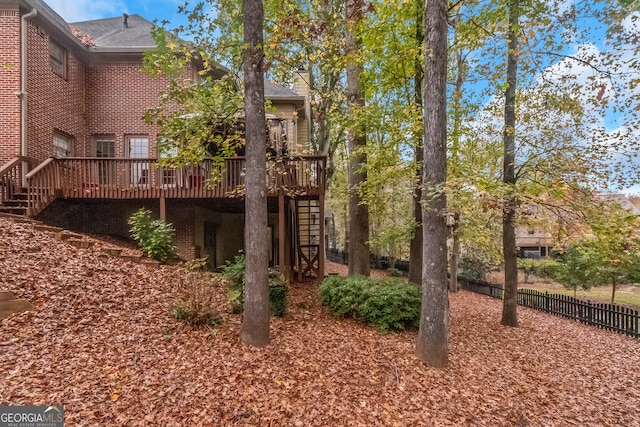 exterior space featuring a wooden deck