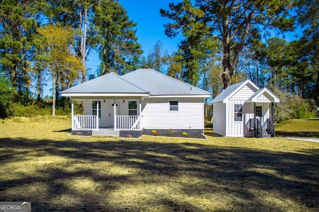 view of front of house with a front lawn and a porch