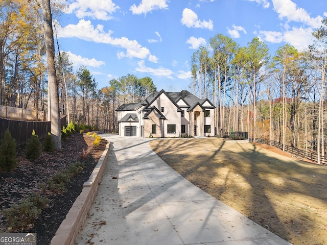 view of front of property with a garage