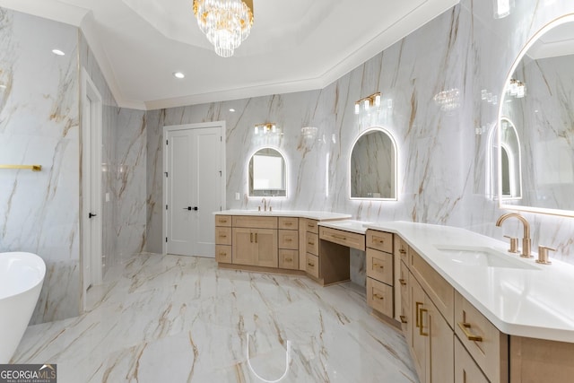 bathroom with a tub to relax in, vanity, a chandelier, and tile walls