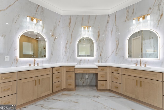 bathroom with vanity and ornamental molding