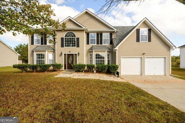 view of front facade featuring a front yard and a garage