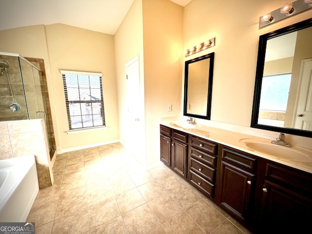 bathroom featuring tile patterned floors, vanity, and independent shower and bath