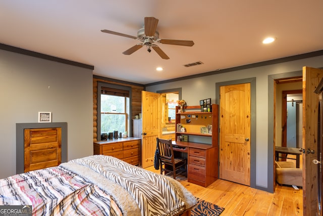 bedroom featuring light wood-type flooring, ceiling fan, and crown molding