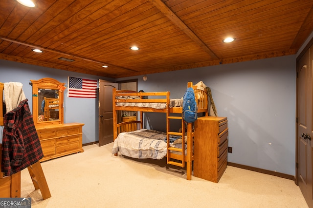 carpeted bedroom featuring wooden ceiling