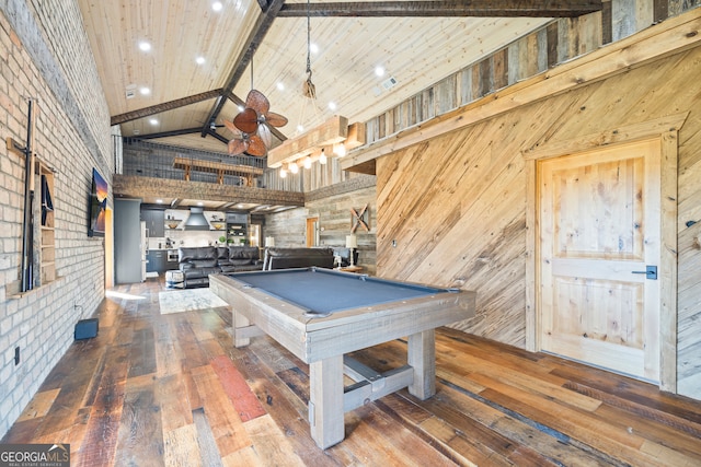 game room featuring wooden walls, beam ceiling, wood-type flooring, high vaulted ceiling, and billiards