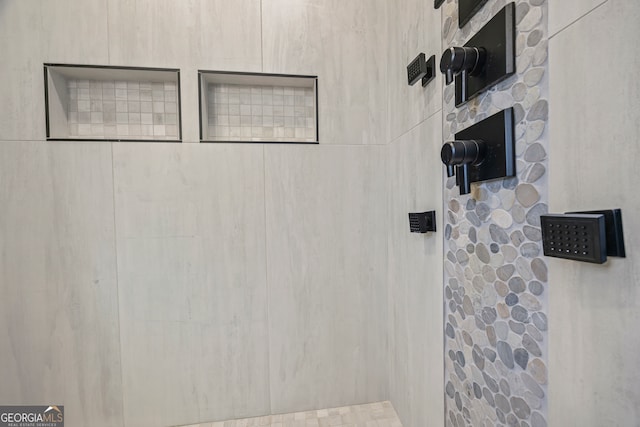 bathroom featuring walk in shower