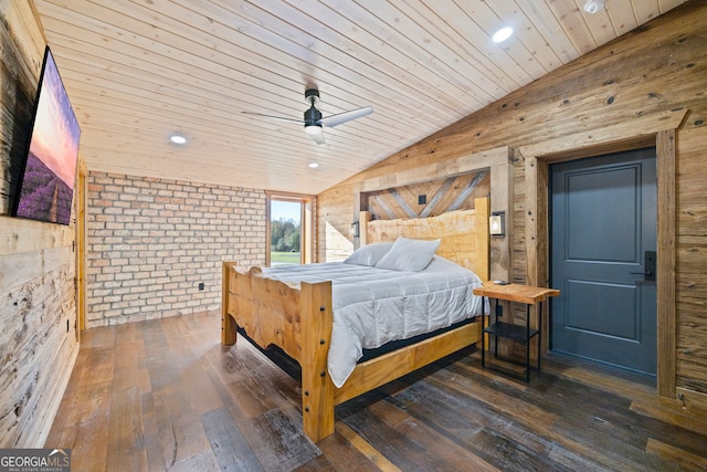 bedroom featuring dark hardwood / wood-style floors, ceiling fan, wood ceiling, and vaulted ceiling