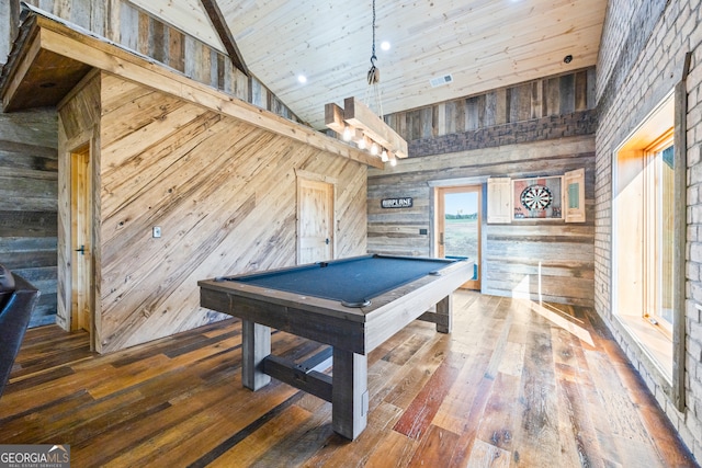 recreation room featuring wood-type flooring, high vaulted ceiling, wooden walls, and billiards