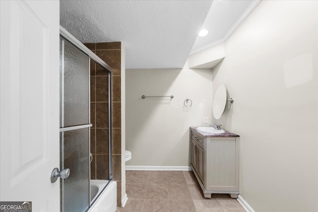 full bathroom with enclosed tub / shower combo, tile patterned floors, a textured ceiling, toilet, and vanity