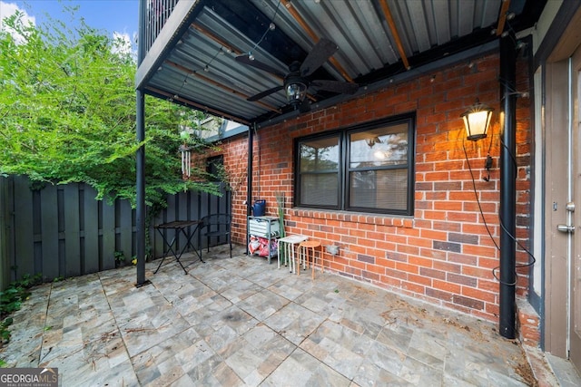 view of patio / terrace featuring ceiling fan