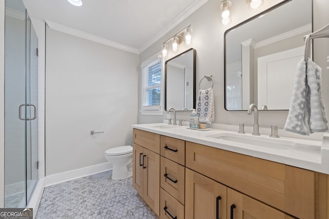 bathroom with tile patterned floors, crown molding, vanity, and a shower with shower door