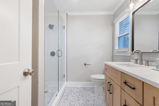 bathroom featuring vanity, tile patterned floors, crown molding, toilet, and an enclosed shower