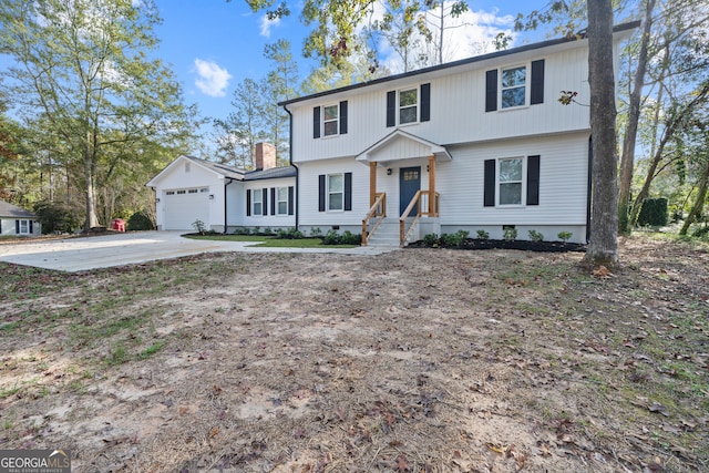 front of property with a garage