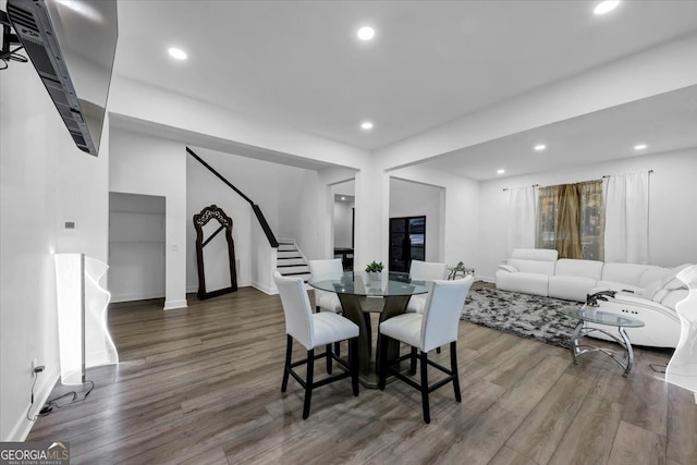 dining area with wood-type flooring