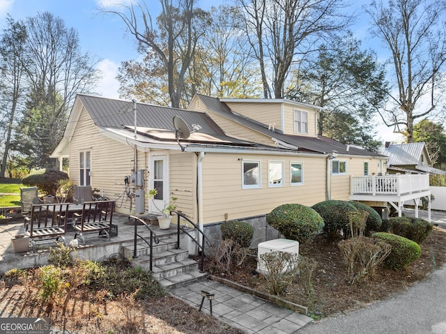 exterior space with a wooden deck