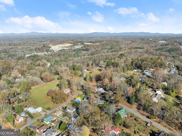 drone / aerial view featuring a mountain view