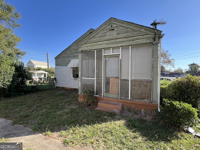 exterior space with a lawn