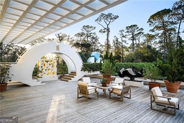 wooden terrace with a pergola