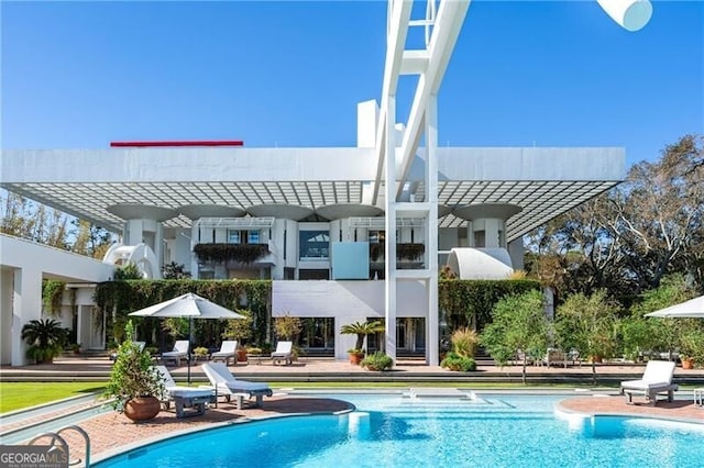 back of house with a patio area