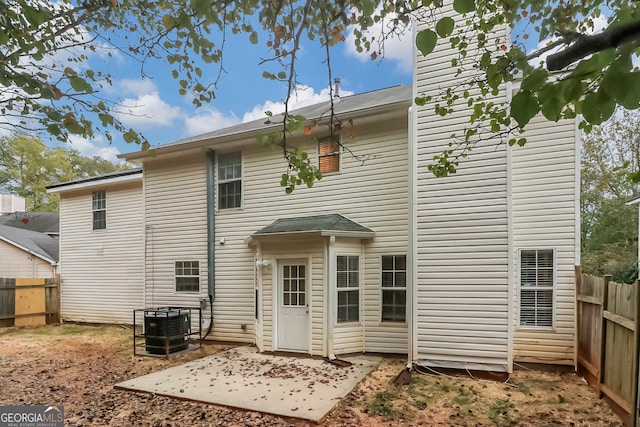 back of house featuring a patio and central AC unit