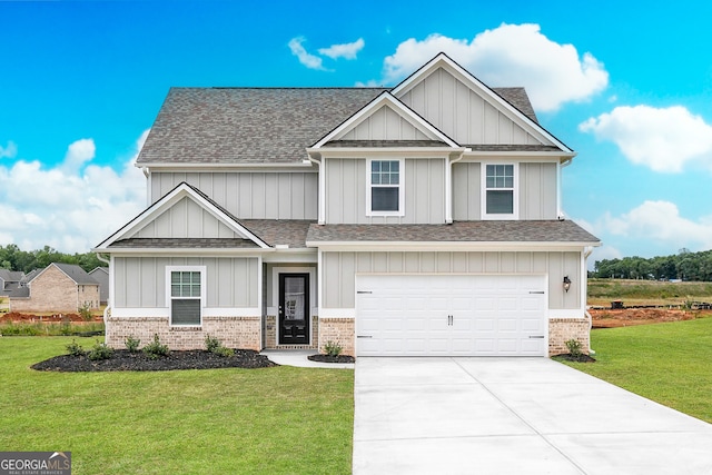 craftsman inspired home with a front yard and a garage