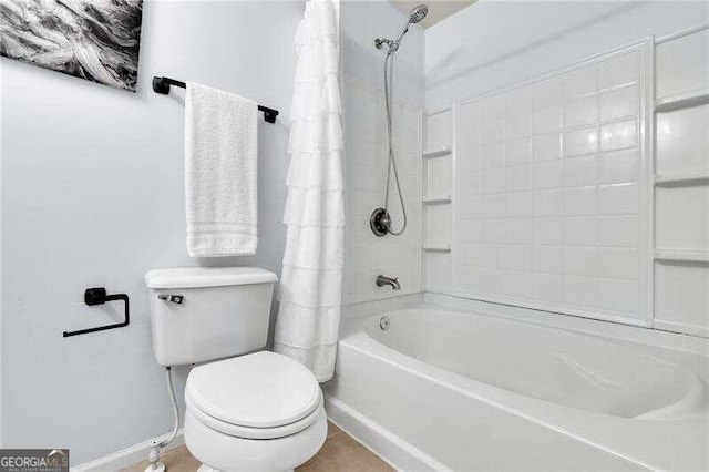 bathroom with shower / bath combination with curtain and toilet