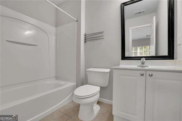 full bathroom with tile patterned flooring, vanity,  shower combination, and toilet