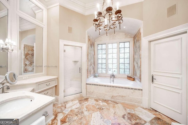 bathroom featuring plus walk in shower, a high ceiling, a chandelier, vanity, and ornamental molding