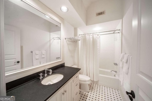 full bathroom featuring shower / bath combination with curtain, vanity, and toilet