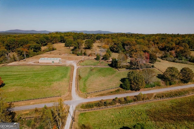 aerial view featuring a mountain view and a rural view