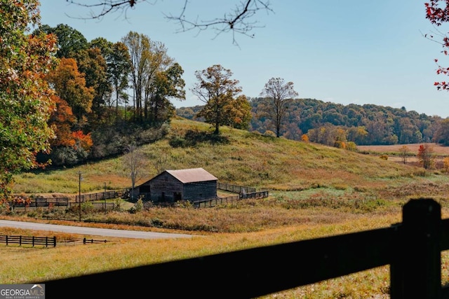 view of mountain feature featuring a rural view