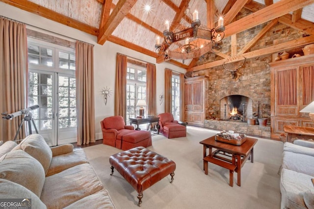 living room with carpet flooring, beam ceiling, a stone fireplace, and high vaulted ceiling