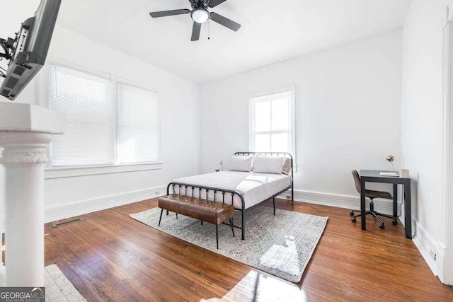 bedroom featuring ceiling fan and hardwood / wood-style flooring