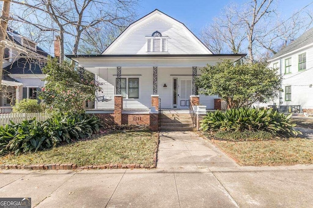 bungalow-style home featuring covered porch