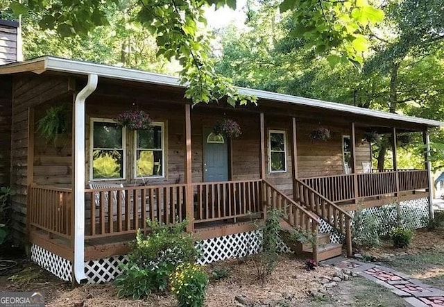 view of front of property featuring covered porch