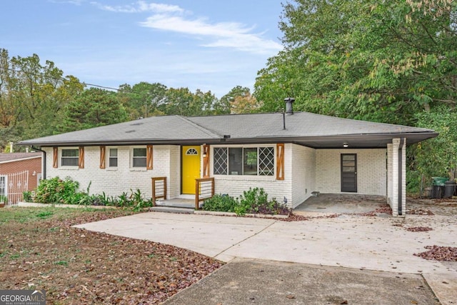 view of front of property with a carport