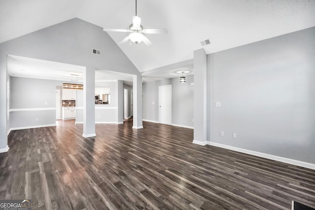 unfurnished living room with dark hardwood / wood-style flooring, high vaulted ceiling, and ceiling fan