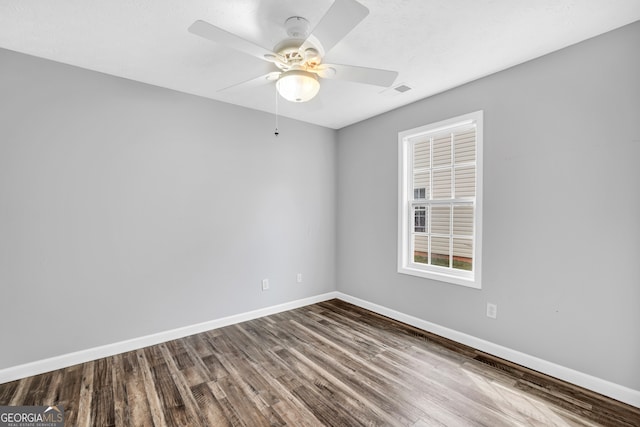 unfurnished room featuring ceiling fan and wood-type flooring