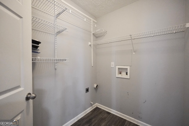 washroom featuring electric dryer hookup, washer hookup, and hardwood / wood-style flooring