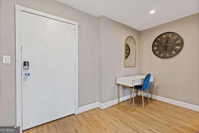 entrance foyer featuring light hardwood / wood-style floors