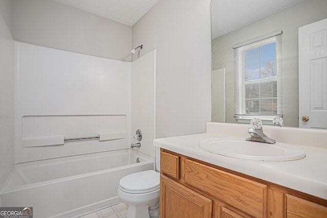 full bathroom featuring shower / washtub combination, vanity, a textured ceiling, and toilet