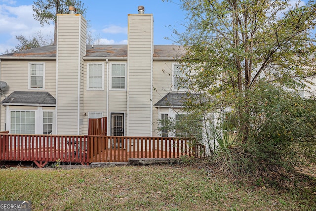 rear view of house with a deck