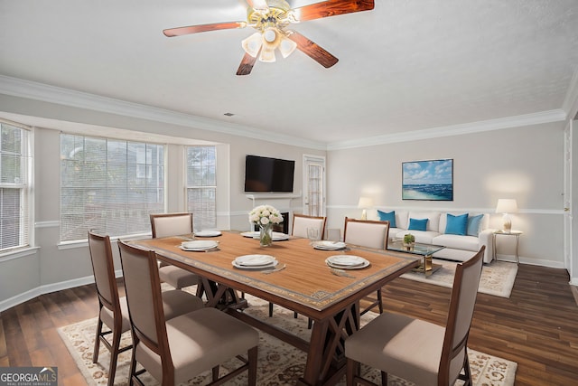 dining area with ceiling fan, dark hardwood / wood-style floors, and ornamental molding