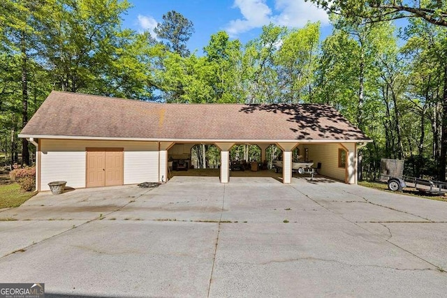 garage with a carport