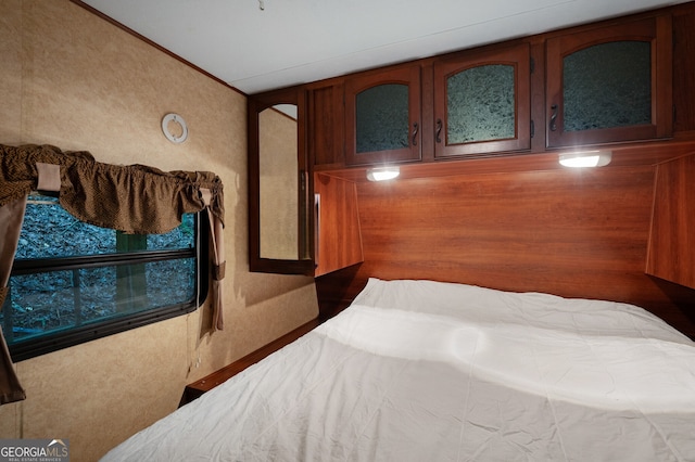 bedroom featuring ornamental molding