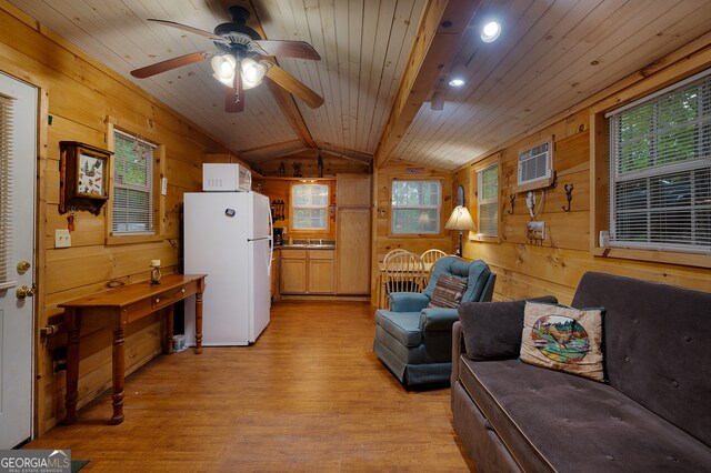 living room featuring vaulted ceiling with beams, light hardwood / wood-style flooring, an AC wall unit, wooden walls, and wood ceiling