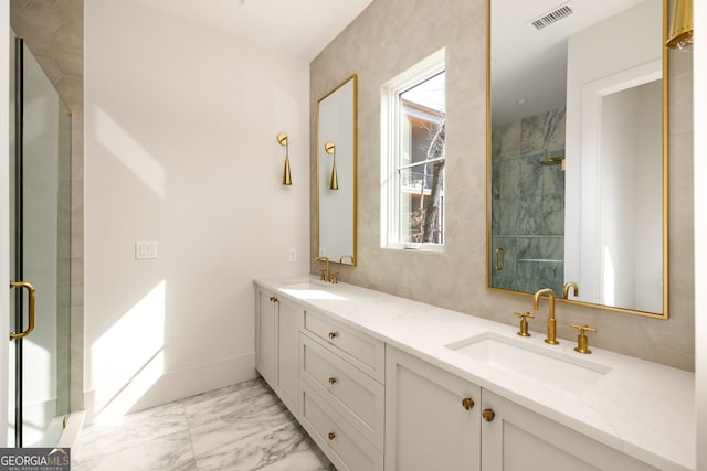 bathroom with vanity and walk in shower